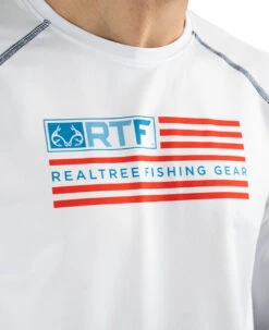 Realtree Fishing Flag Long Sleeve Performance Men's Raglan White Shirt -Realtree M106 WH DETAILS.JPG 61083.1687525400